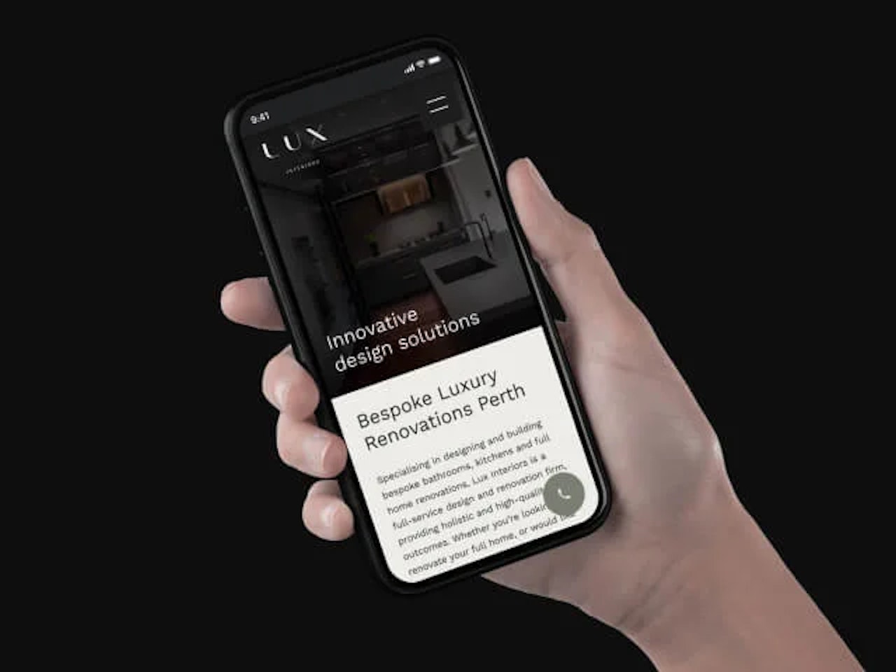 A photo of an iPhone mockup with the Lux Interiors website featured inside of it.